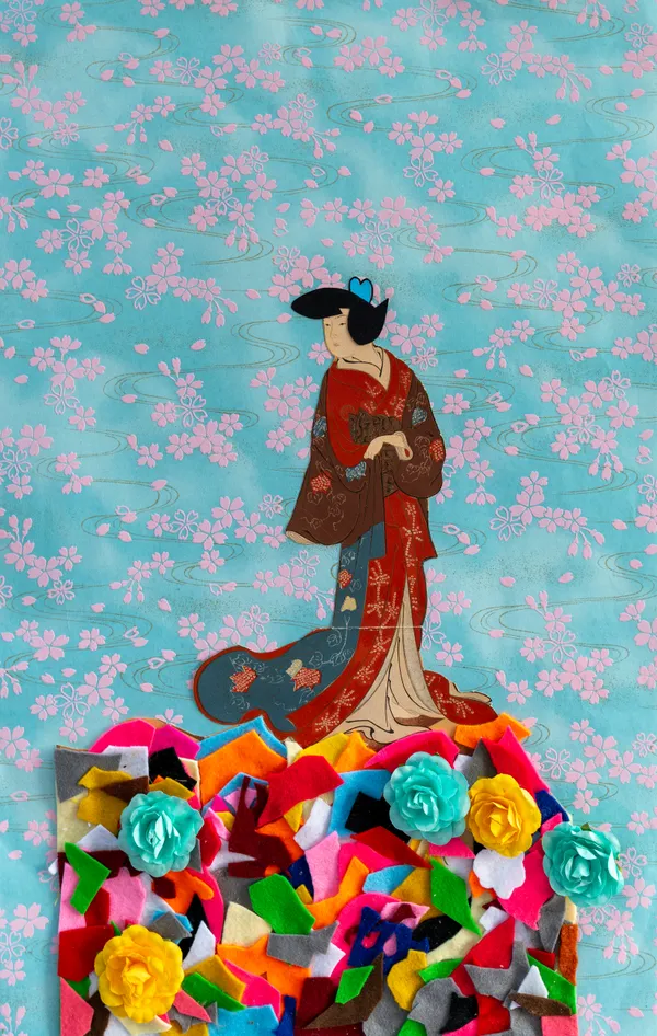 This contemporary collage juxtaposes a traditional Japanese ukiyo-e style figure against a serene, cherry-blossom-patterned background. The composition is anchored by a vibrant, tactile pile of multicolored felt scraps and artificial flowers, blending historical aesthetics with playful modern materials. The work explores cross-cultural themes through the layering of paper, fabric, and craft elements.